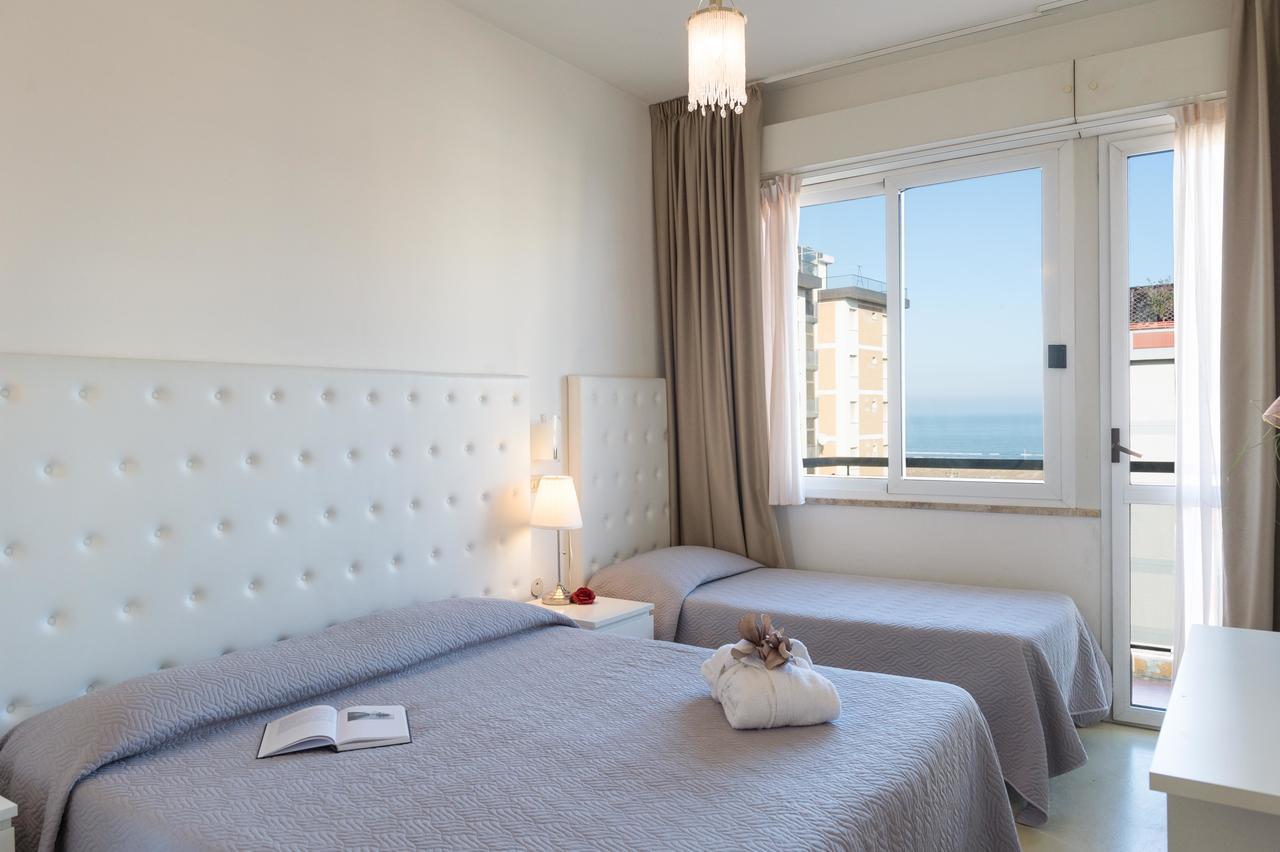 Hotel La Perla Римини Экстерьер фото