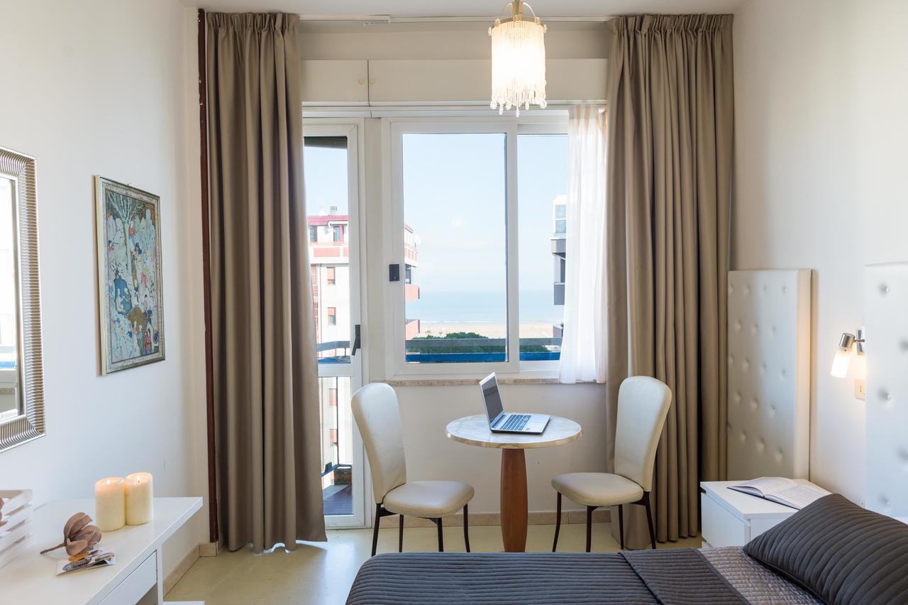 Hotel La Perla Римини Экстерьер фото